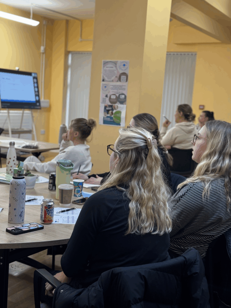 Training In Action An image showcasing a learning environment hosted by the Academy
