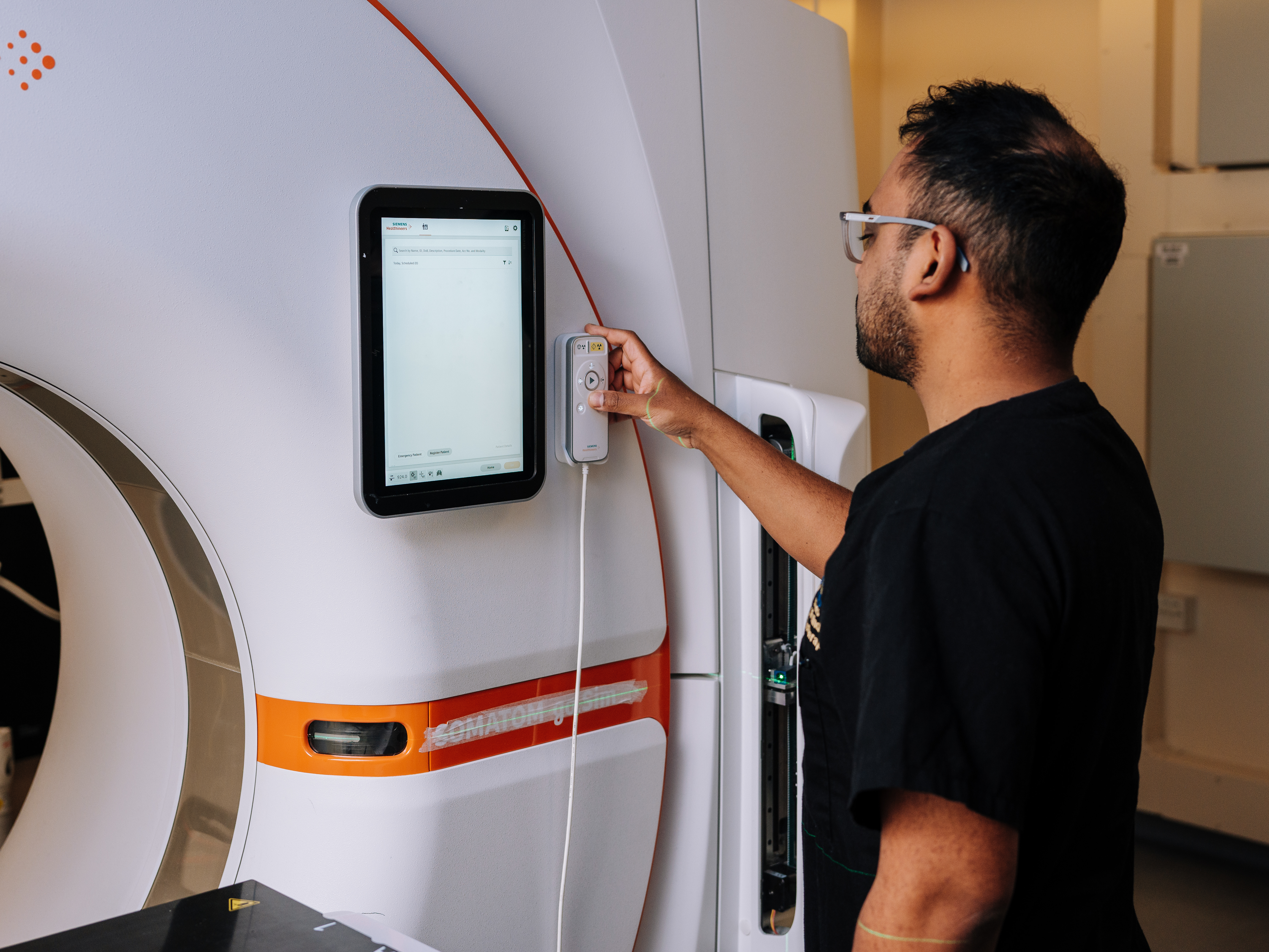 Radiographer Pressing CT 2